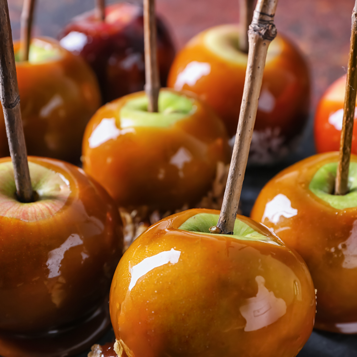 Homemade caramel apples coated in rich caramel